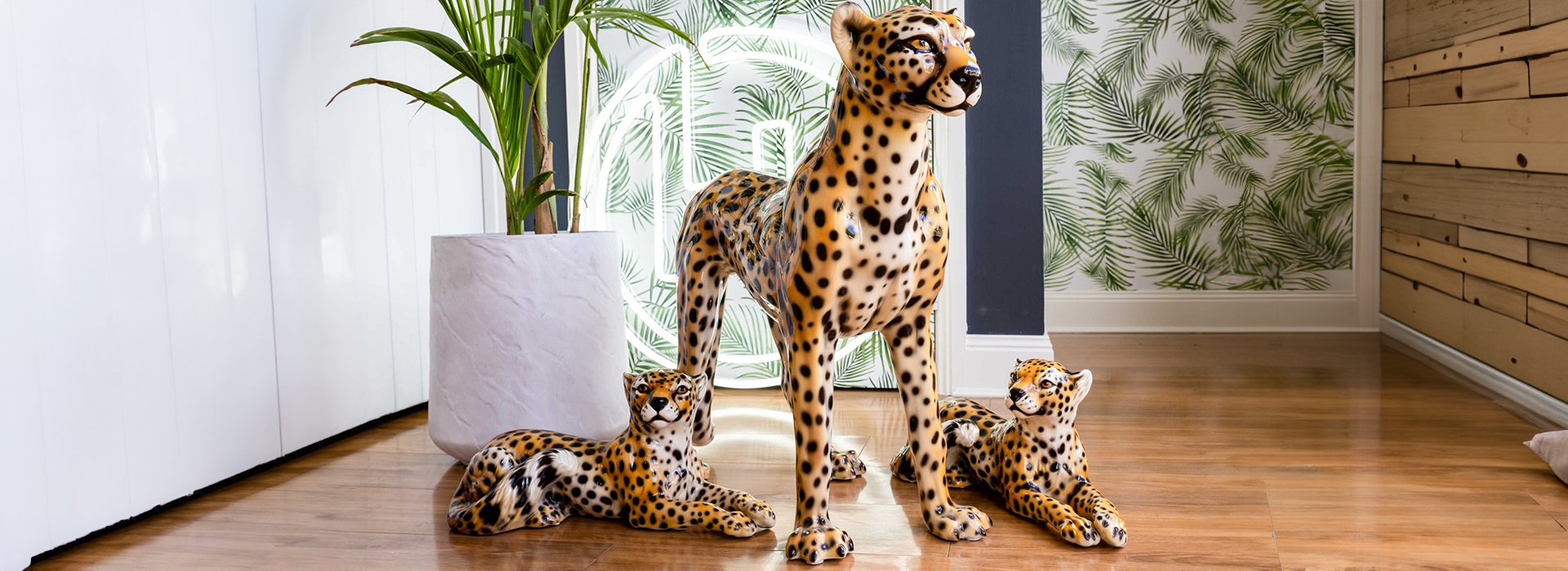 Cheetah sculptures displayed in stylish modern room